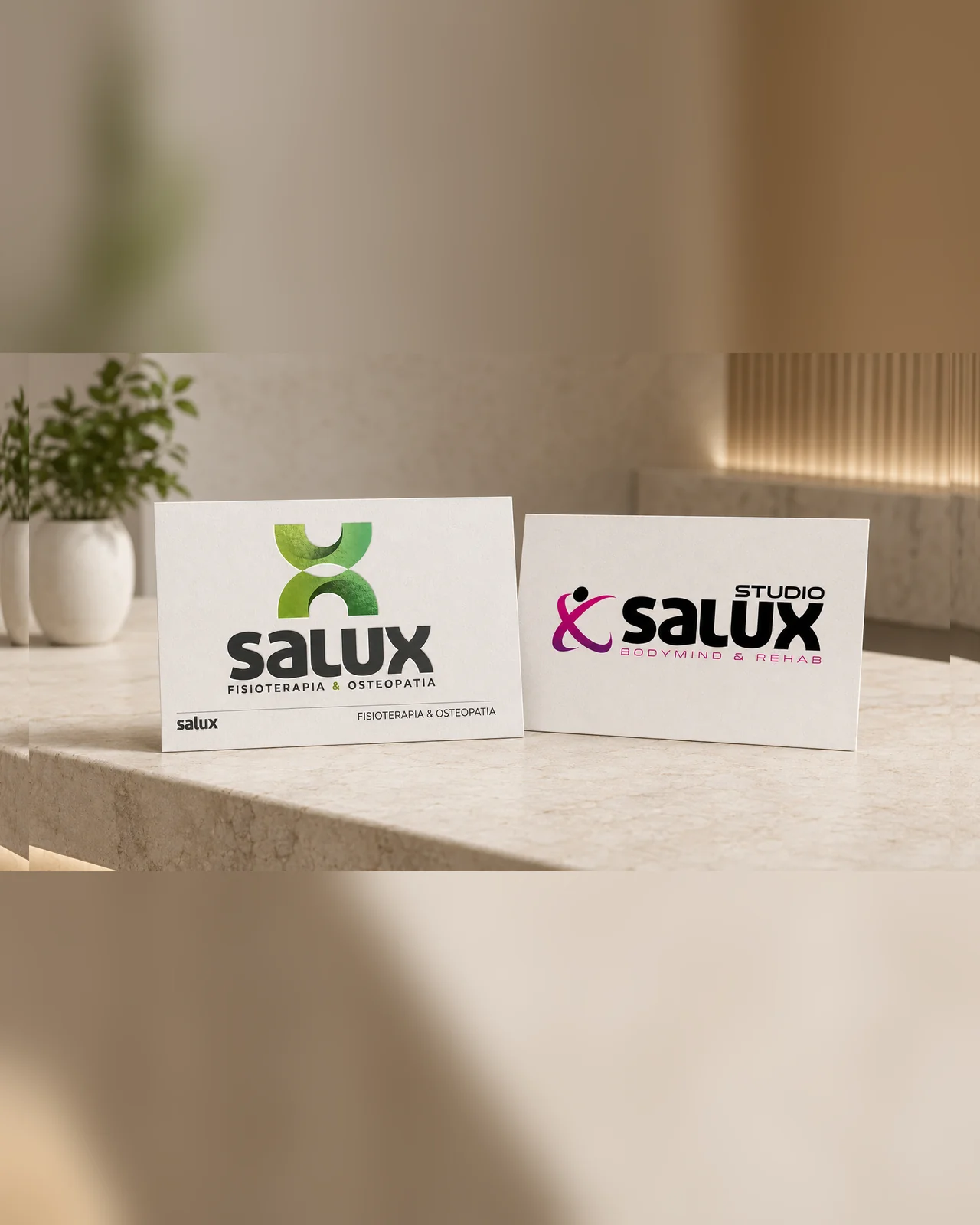 Tarjetas corporativas de Clínica Salux y de Studio Salux